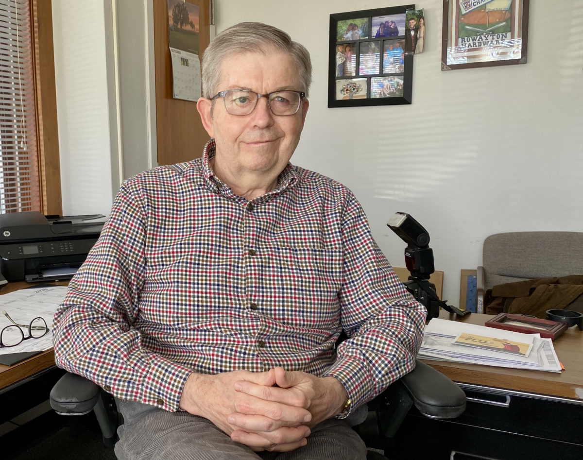 business manager at his desk